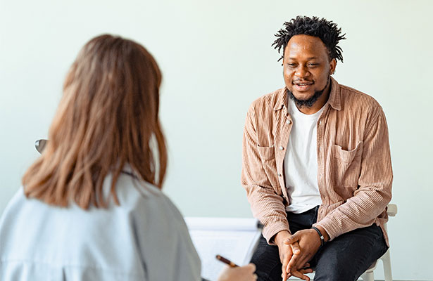 Man in a therapy session with a therapist