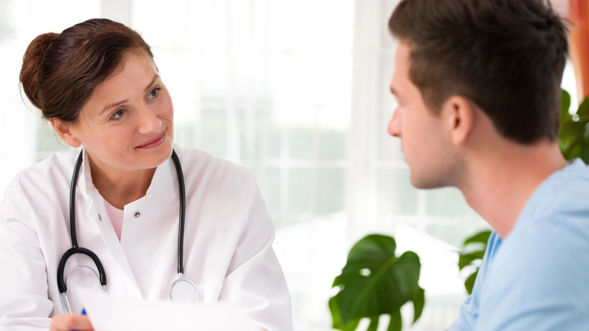 doctor with male patient