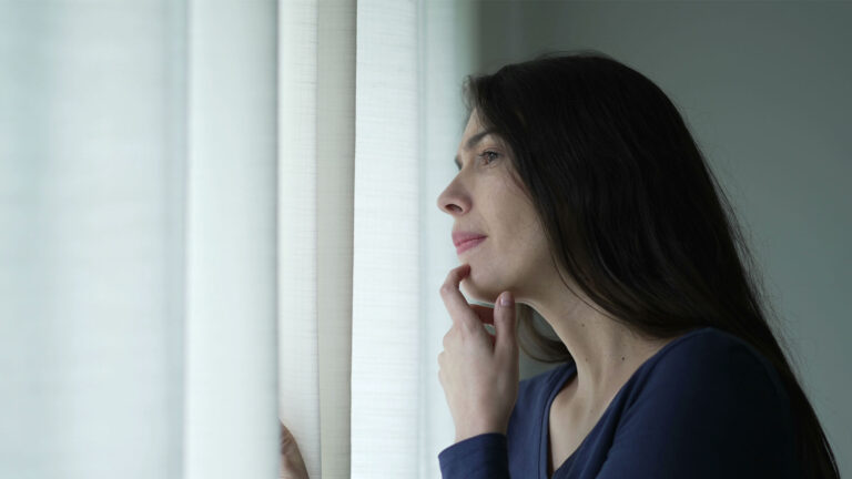 paranoid person preoccupied staring out