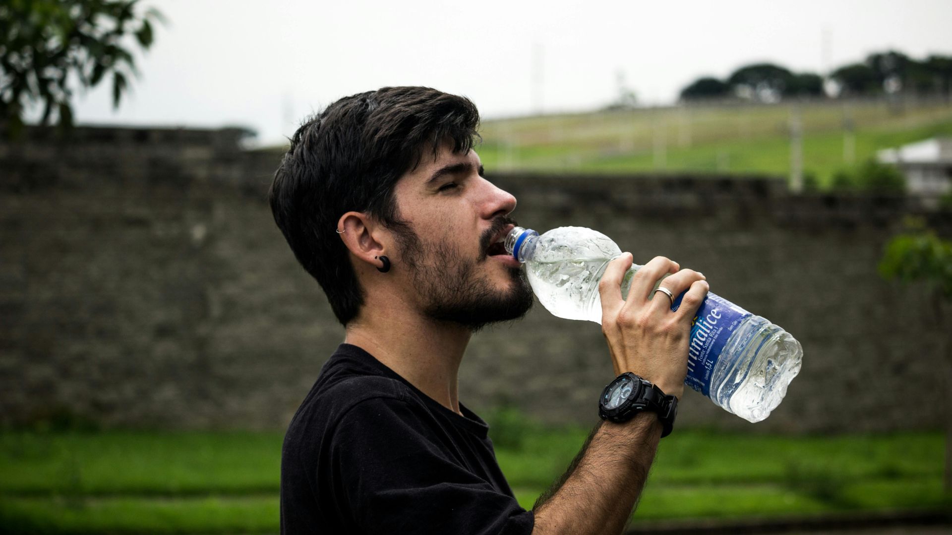 man drinking water