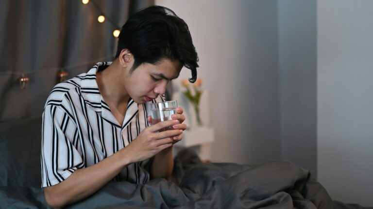 man drinking water