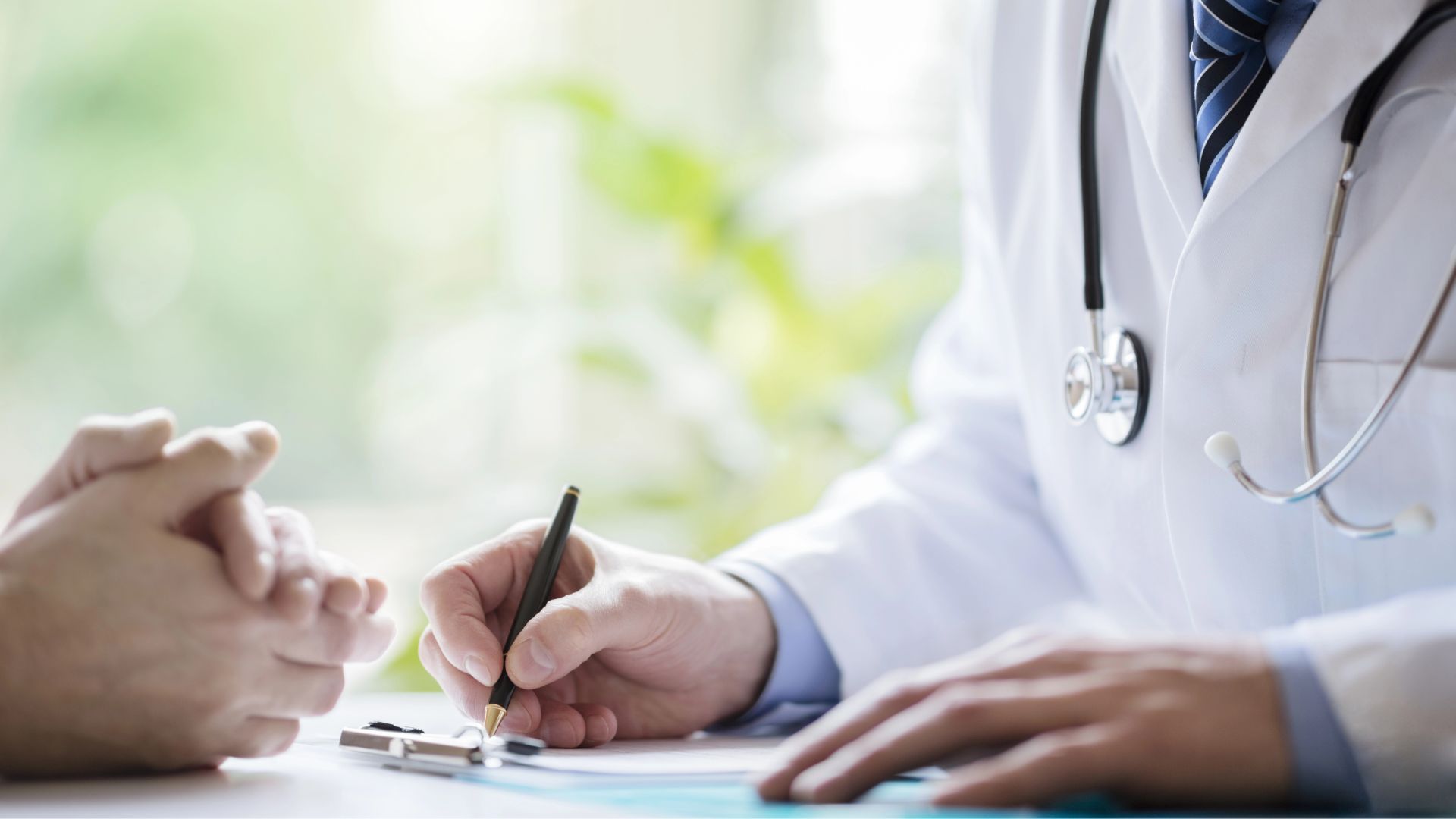 Doctor and patient taking notes for medically supervised detox