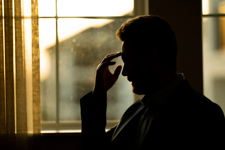 man suffering headache