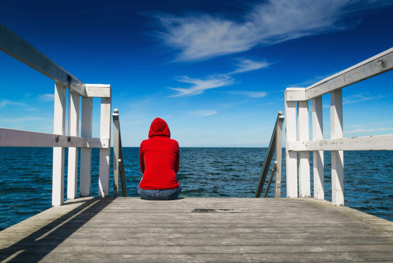 alone woman in red shirt