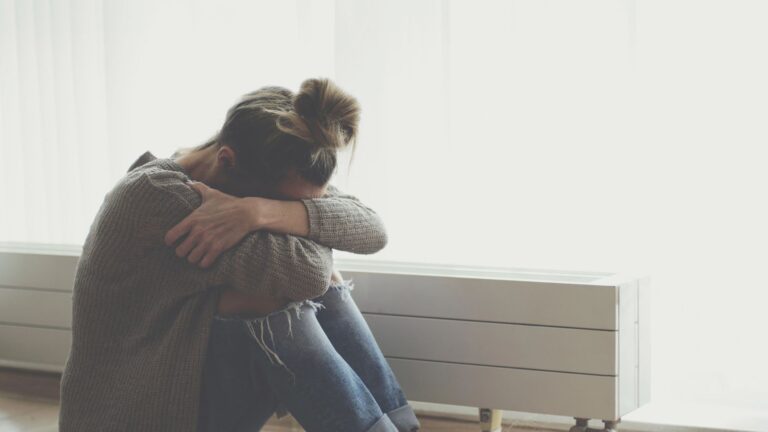 young woman feels depressed and stressed