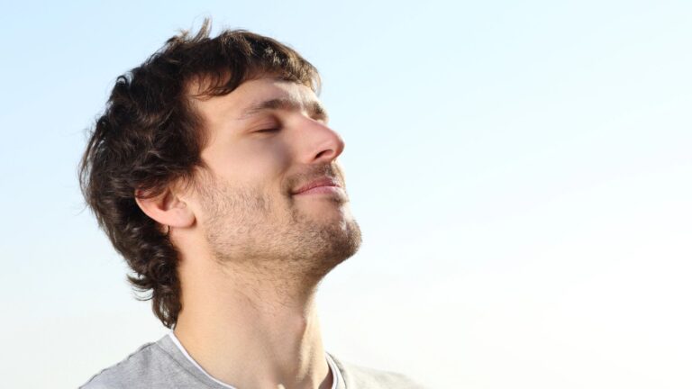 man doing breath exercises outdoor