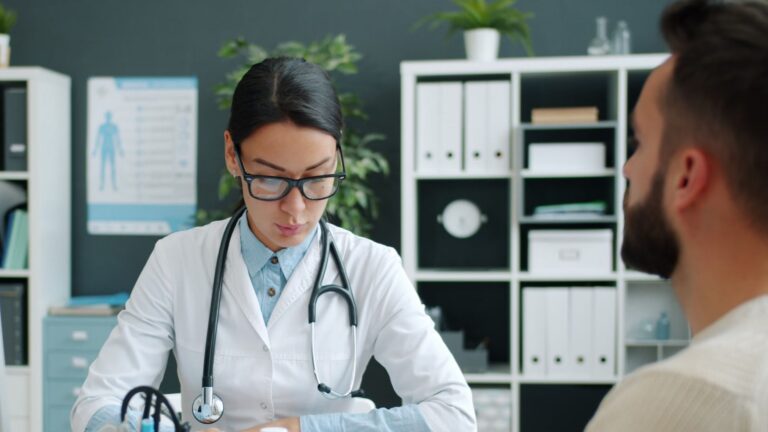 A female doctor consulting a patient